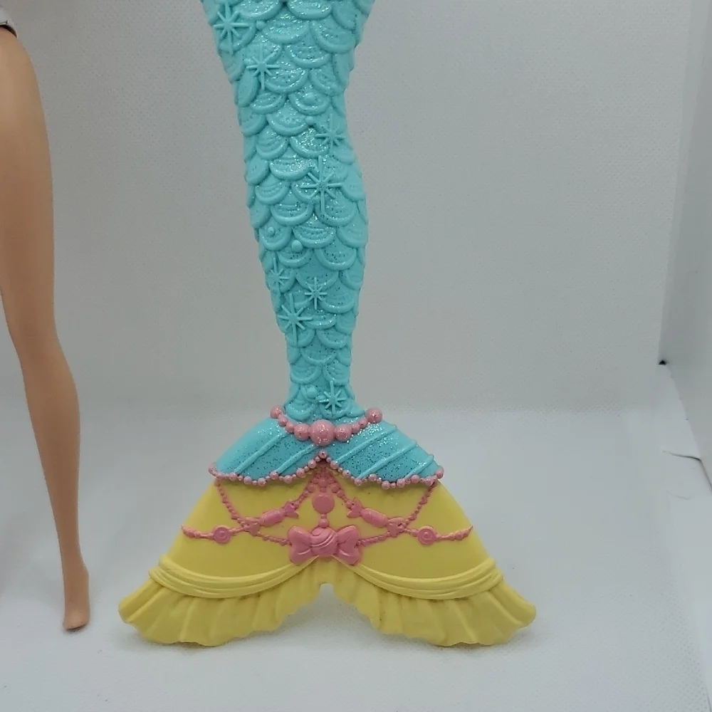 Mattel Dolls with Blonde Hair and Colorful Outfits